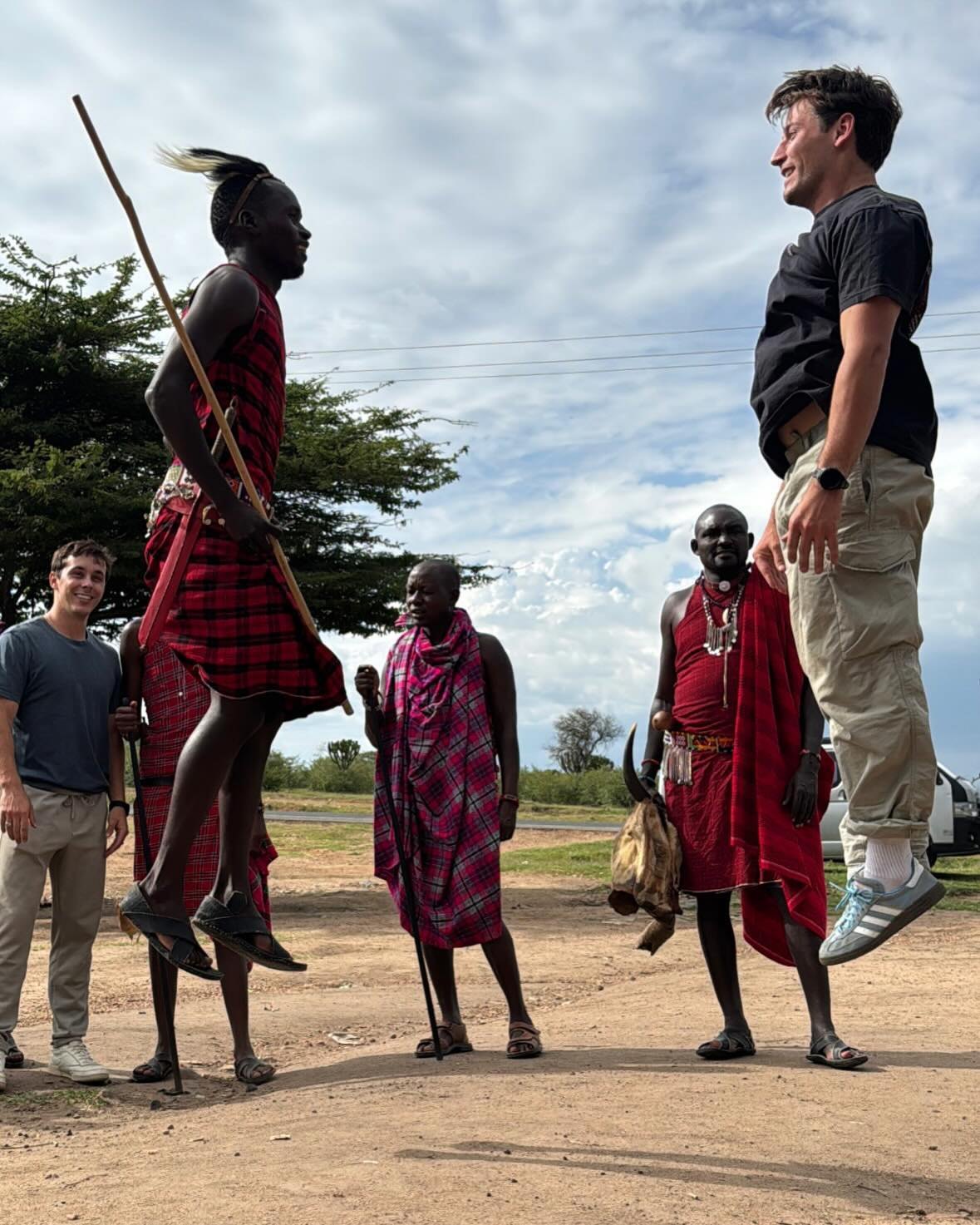 Drake jumping with Maasai warriors